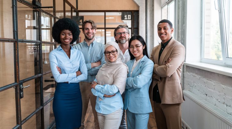 start up business team in the office. Multiethnic group working together on a new project in the conference room
