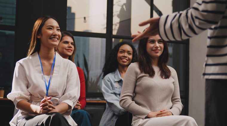 Group of businesswoman or audience of workshop or team meeting in office with creative idea development.