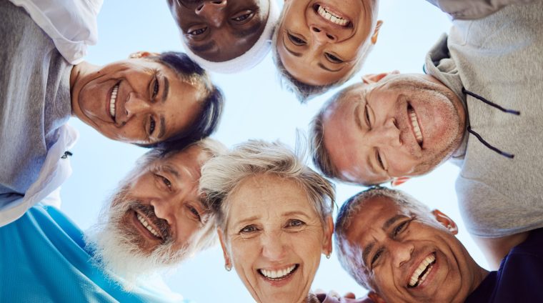 Portrait, senior or friends with fitness goals, support or hope in huddle bonding in training, spor.